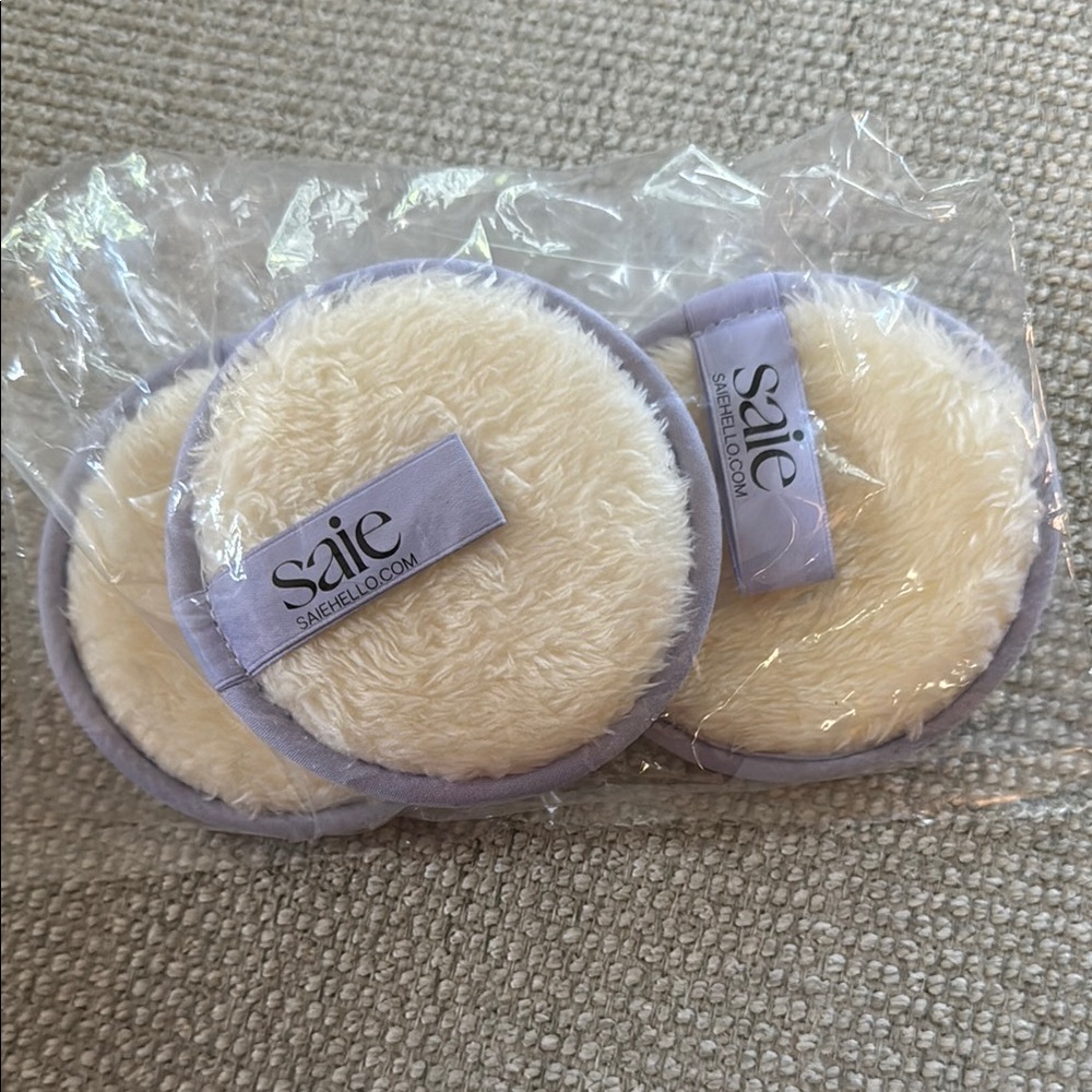 Saie Cream and Purple Exfoliating Bath Tools